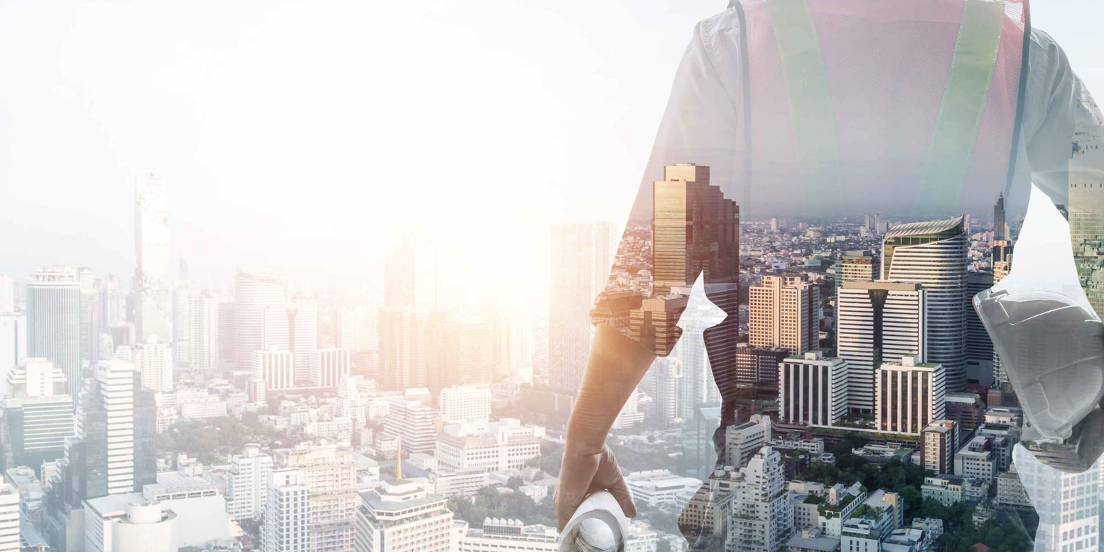 styalised picture of tradie looking over a city