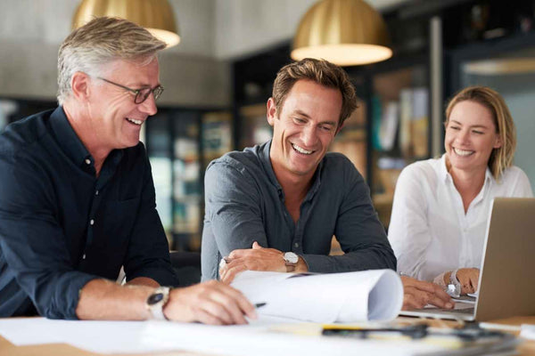 Successful tradie business partners using Construction Diary for business management and growth