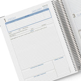 Spiral-bound planner open to a page for January 2027 with daily layout.